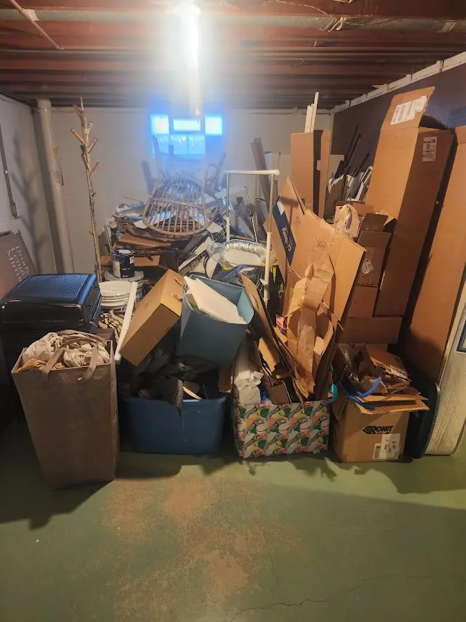 Roll-off dumpster container at job site for 2 Yard Dumpster Rental in Escatawpa